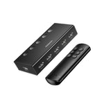 Black electronic device with remote control on a white background