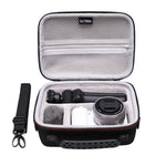 Black carrying case with a camera and accessories on a white background