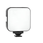 Camera light modifier with a camera on a white background