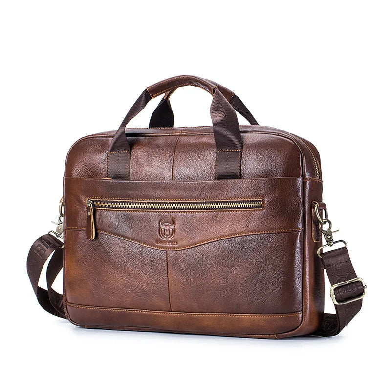 Brown leather briefcase with shoulder strap on a white background