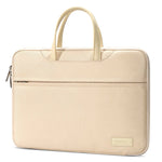 Beige laptop bag with a small pouch containing electronic devices on a white background