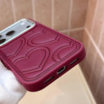 Embossed Heart Leather Case with Raised Camera Frame for iPhone 18 Series