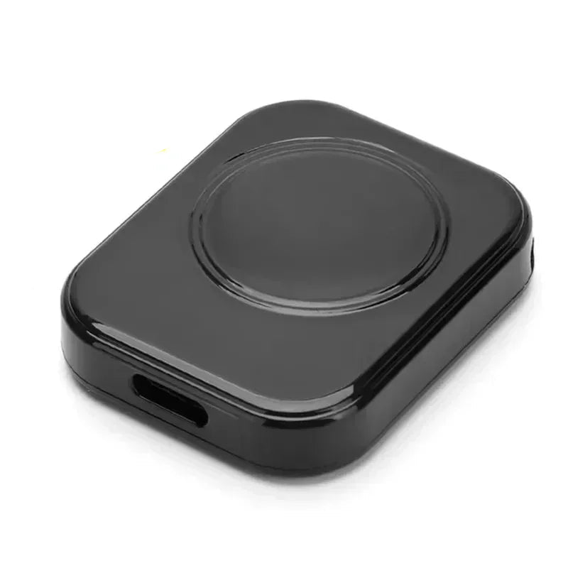 Black wireless charging pad with Type C input on a white background