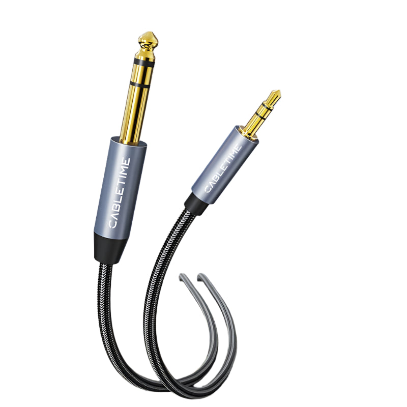 Audio cable with gold connectors on a white background